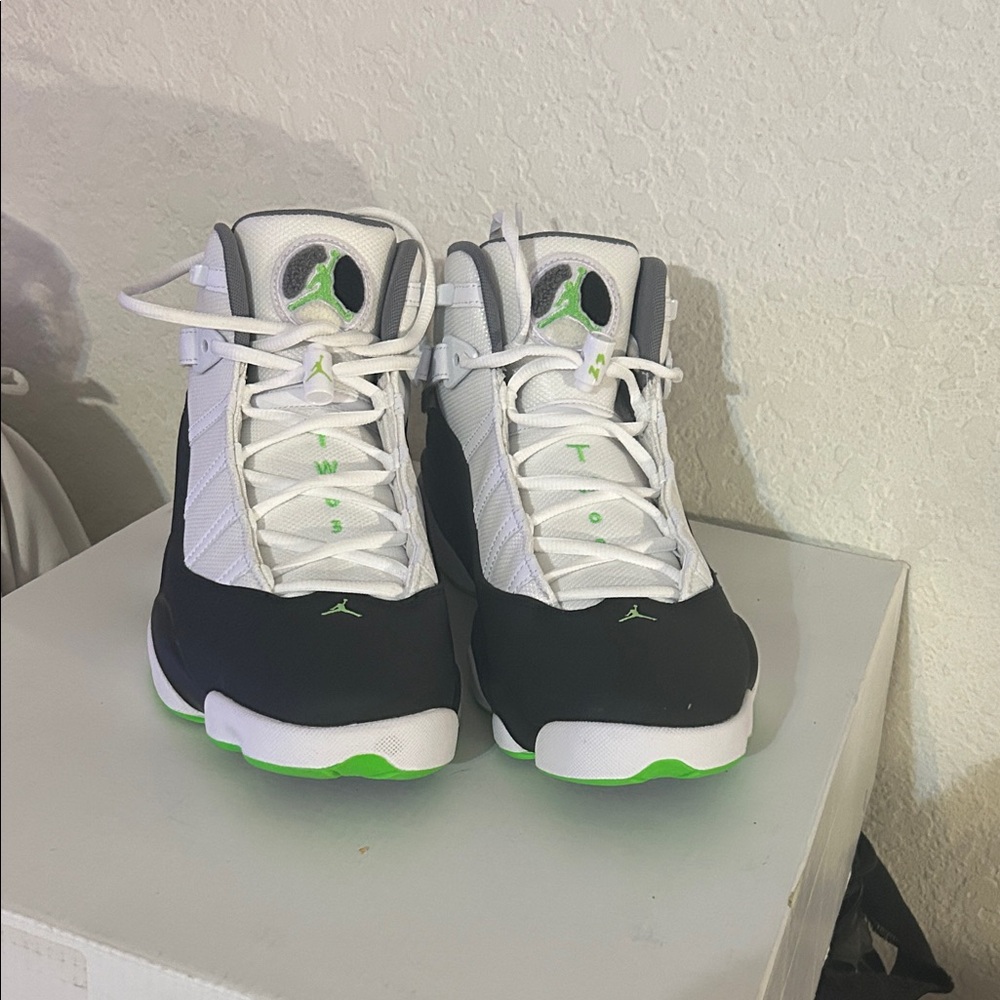 Jordan Black and White Sneakers with Green Accents